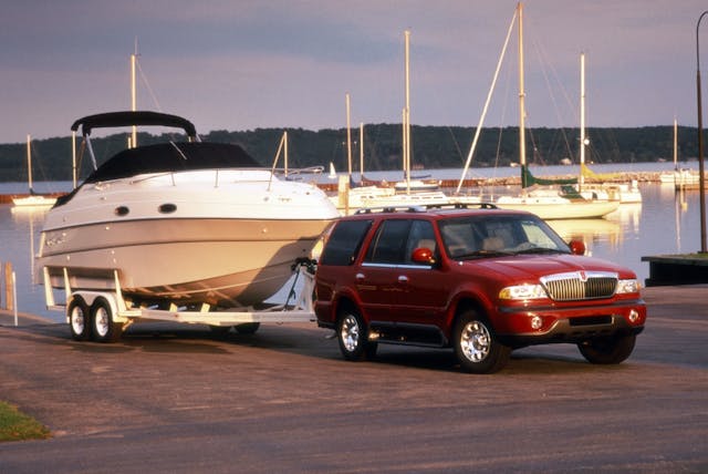 1st Generation Lincoln Navigator SUV front three quarter towing