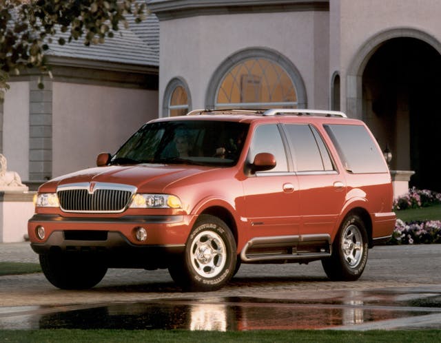 1st Generation Lincoln Navigator SUV front three quarter red