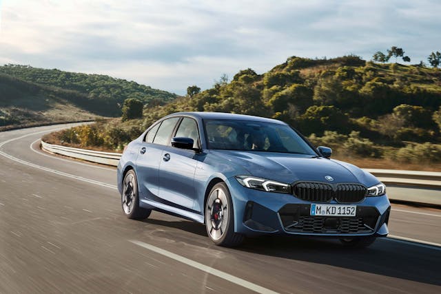 2025 BMW 3 Series exterior blue front three quarter driving on road