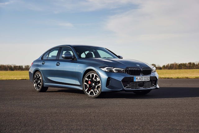 2025 BMW 3 Series exterior blue low front three quarter parked on runway