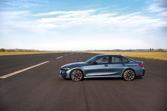 2025 BMW 3 Series exterior blue side profile parked on runway