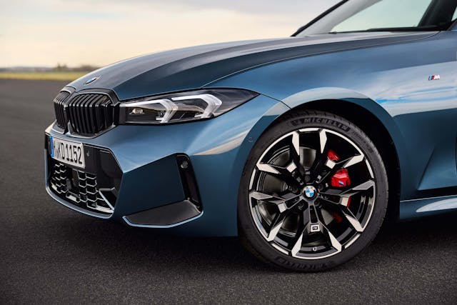 2025 BMW 3 Series exterior blue wheel tire and grille detail