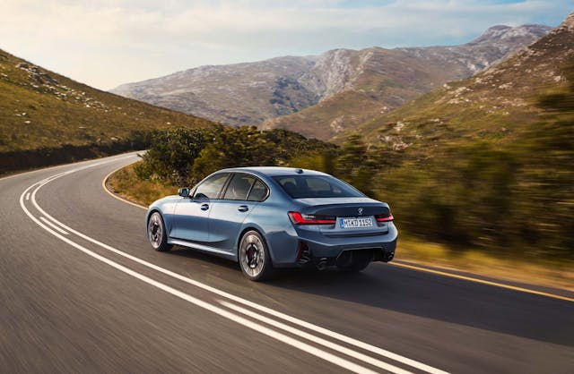 2025 BMW 3 Series exterior blue high rear three quarter driving on road