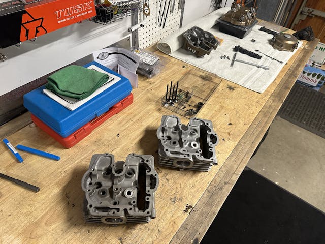 xr250r cylinder heads on workbench