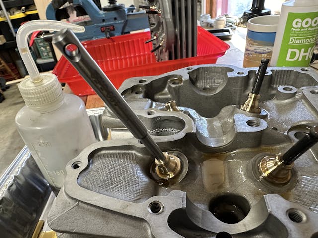 Valve guide pilot for sizing guide