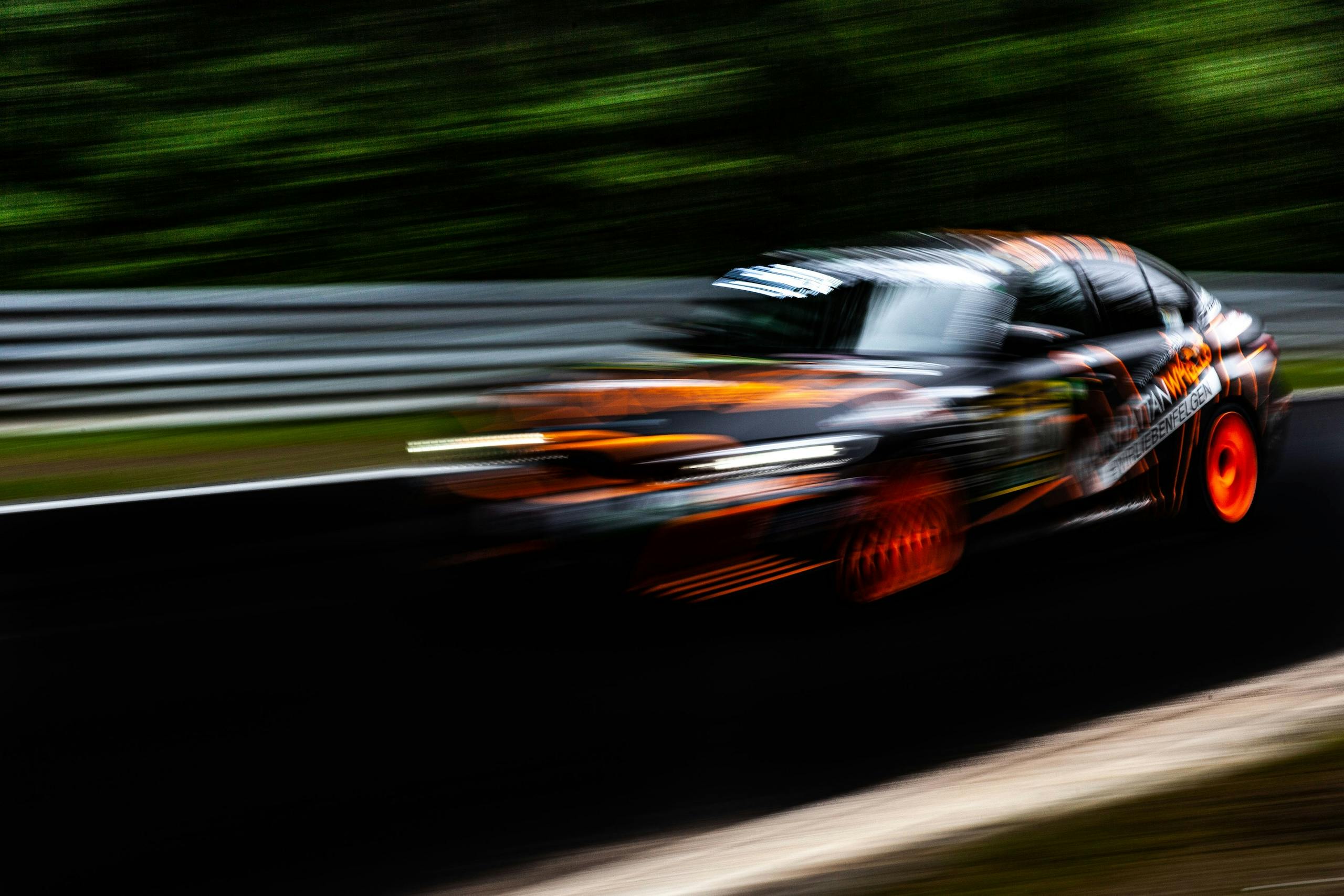 2024 Nürburgring 24 Hours orange black car blur action