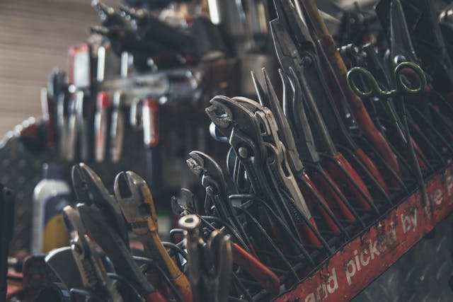 auto shop tool pliers vice grips clppers closeup