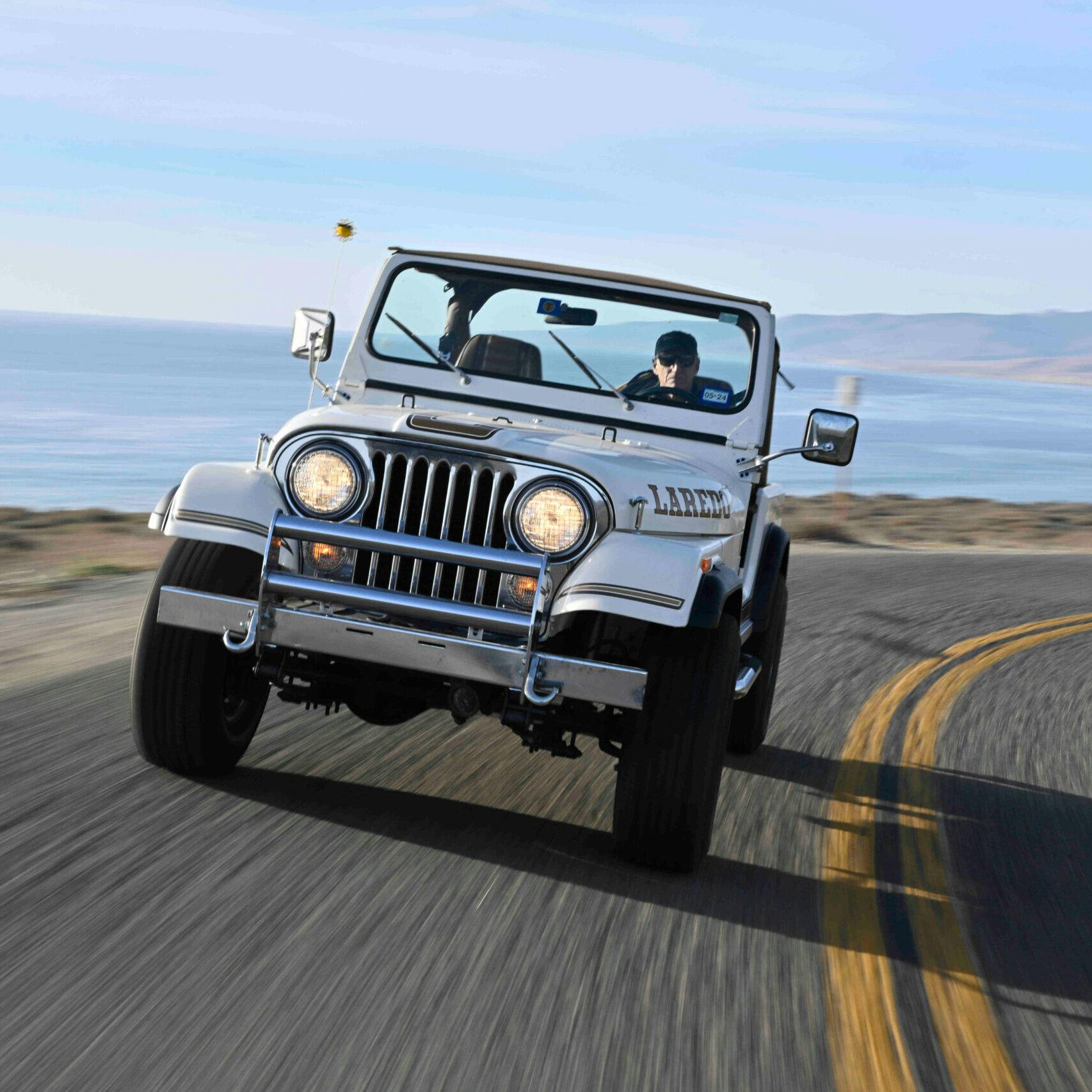 Jeep Wrangler Laredo CJ-7 front driving action cornering