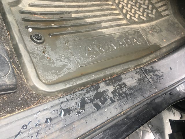 Nissan Aramada floor mat leak puddle