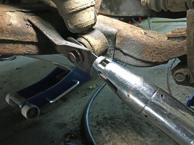 Nissan Aramada shock bolt cut