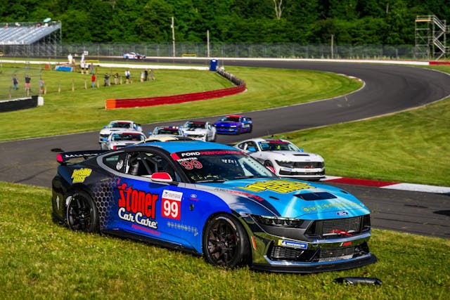 Mustang Challenge Mid Ohio Webster car front three quarter in grass