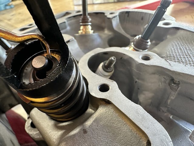 installing keepers into valve springs