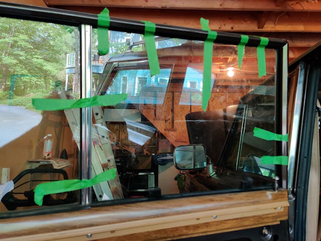 1987-Jeep-Grand-Wagoneer-Flex-Track-Install taping glass up