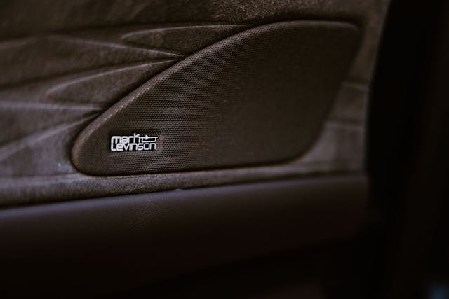 2024 Lexus RX 450h+ interior Mark Levinson stereo door speaker detail