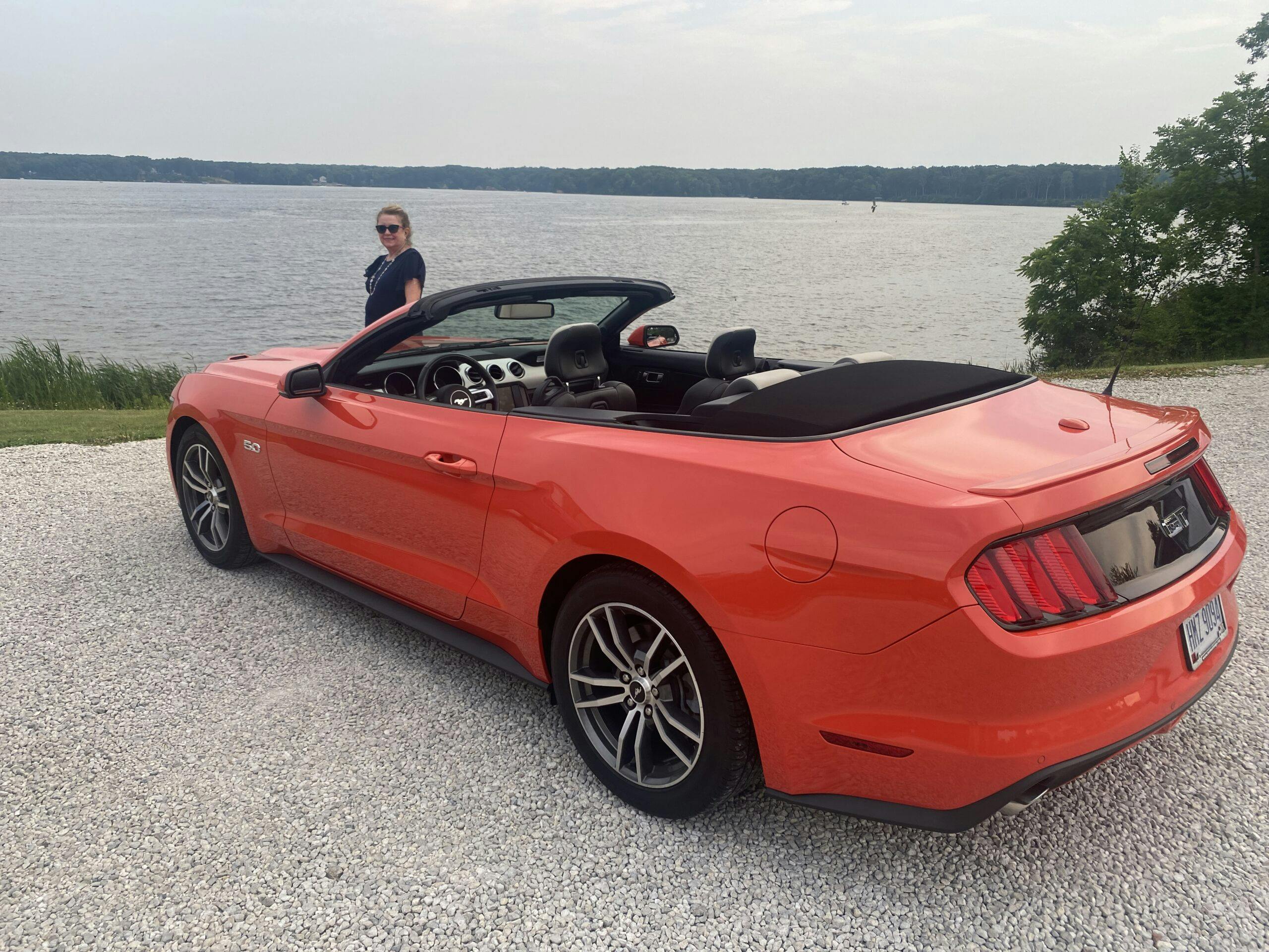 2015 Competition Orange Mustang GT convertible rear three quarter