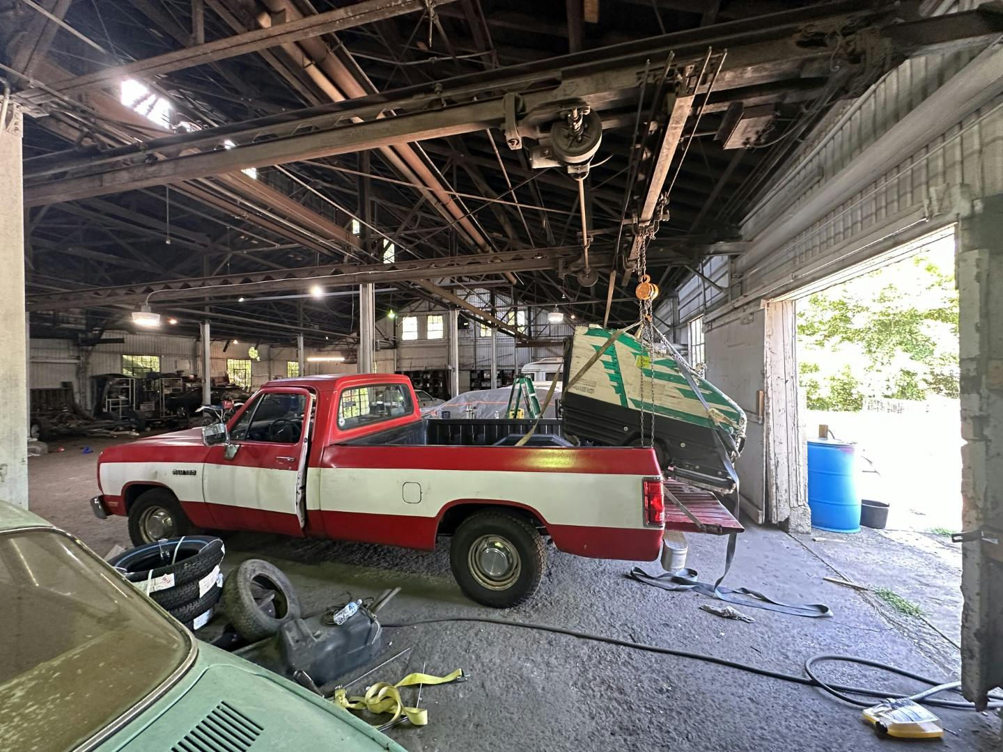 Dodge Ram 150 shop truck side under gantry