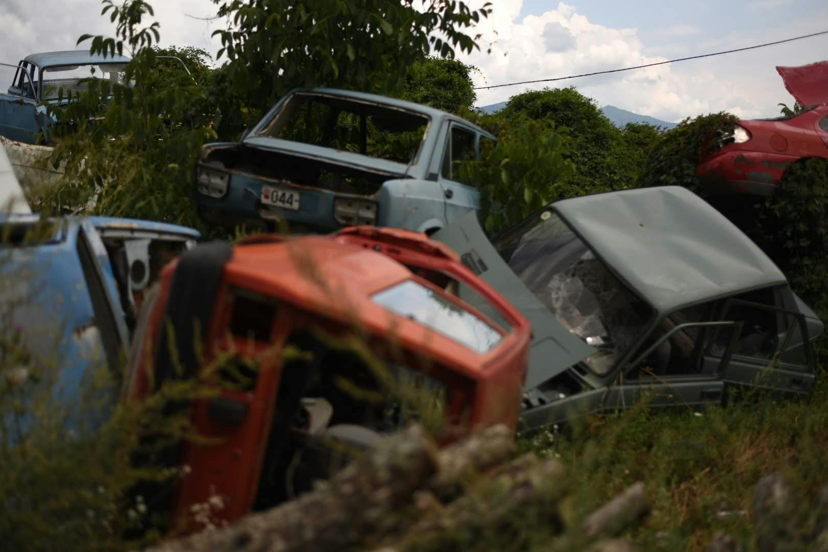 Cars in an Eastern European junkyard