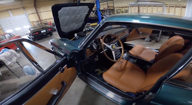 Tom Yang examines a Ferrari 330GTC