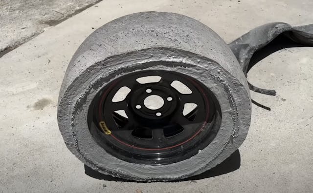 Stone wheels on a car experiment concrete tire on steel wheel standalone