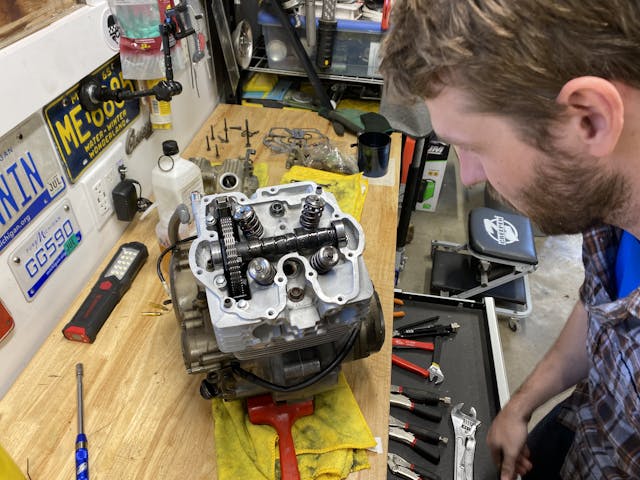 Kyle working on Honda XR250R engine