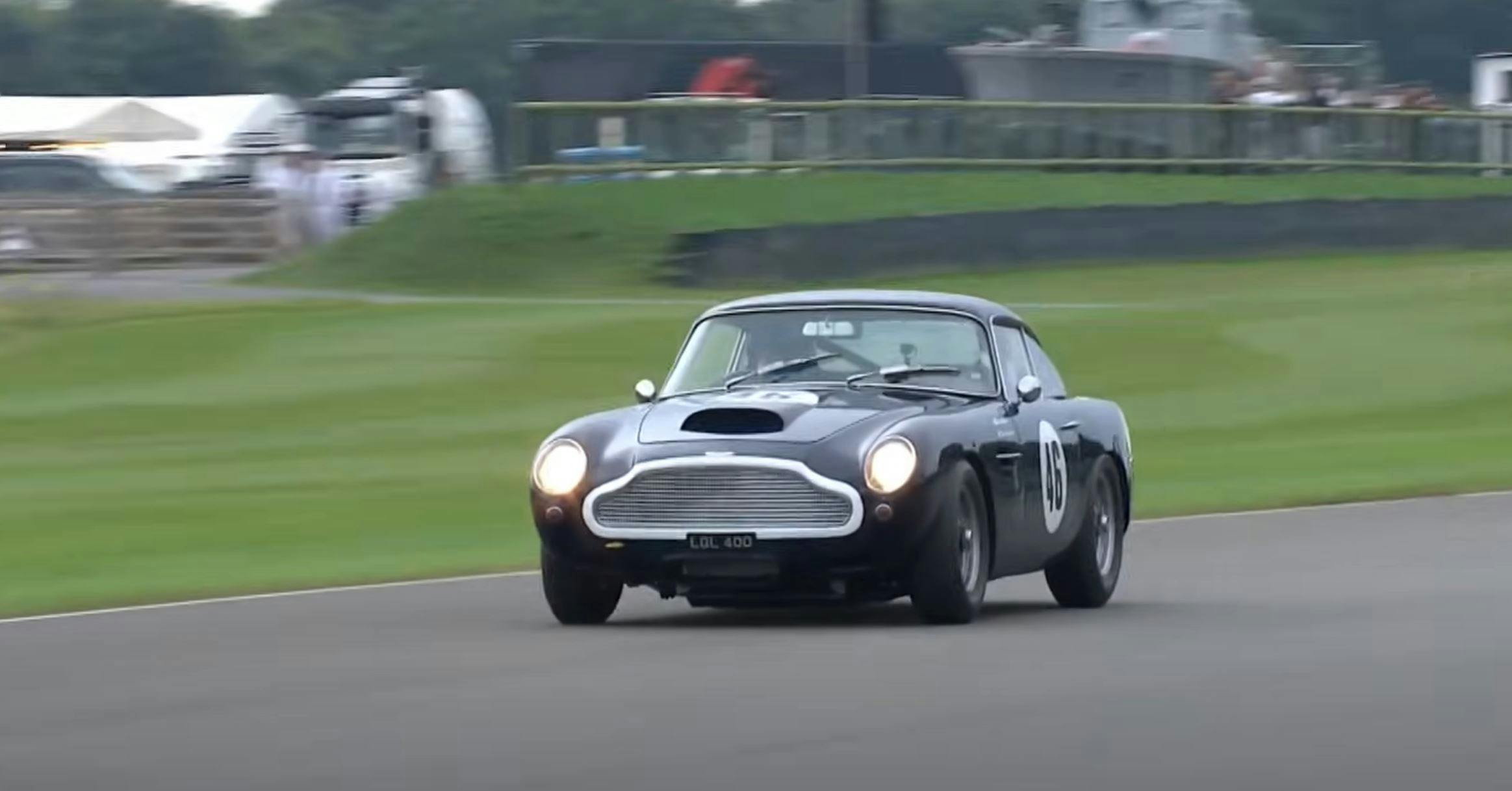 Jimmie Johnson 1960 Aston Martin DB4GT Lightweight racing action front