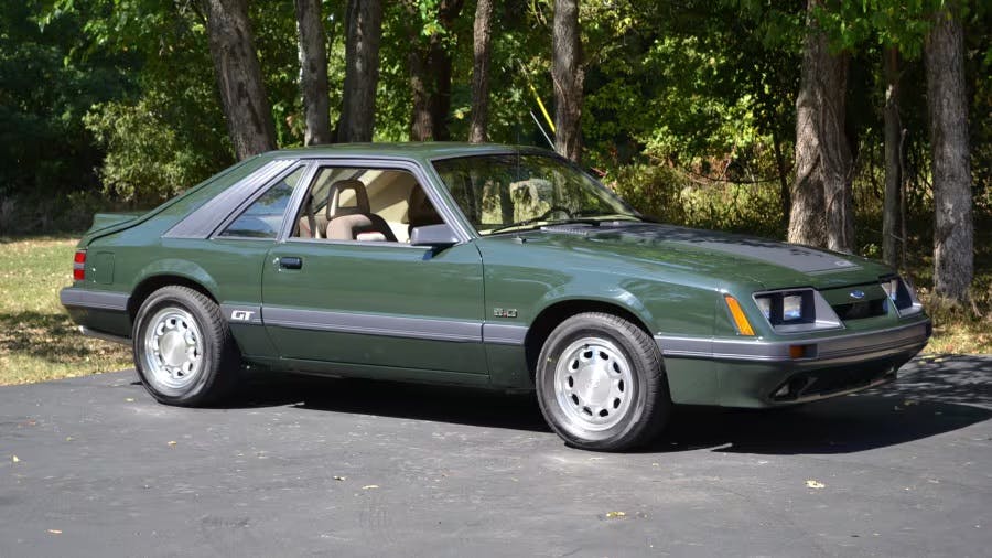 1986 Ford Mustang GT dark sage passenger 3/4