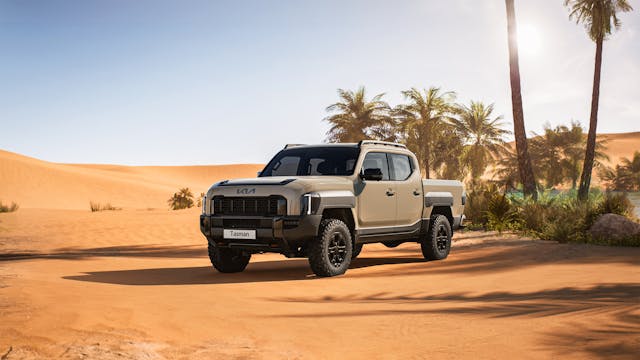2025 Kia Tasman X-Pro exterior front three quarter in desert