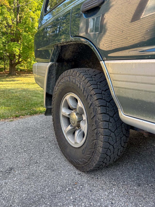 Montero tire upsizing Kumho RoadVenture rear tire looking rearward