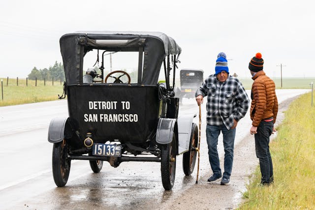 Kyle Smith and Sonny beside Model T
