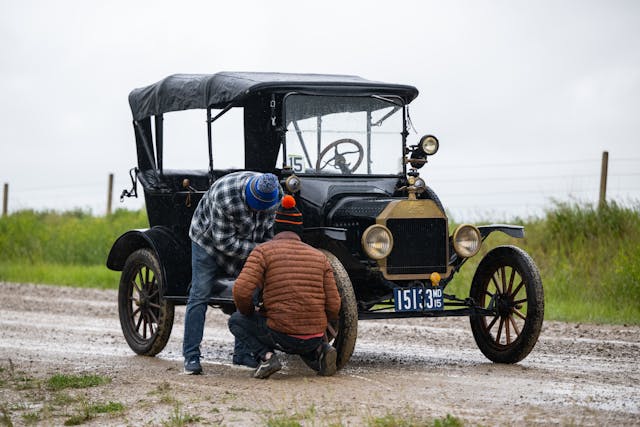 Kyle Smith and Sonny assessing Model T