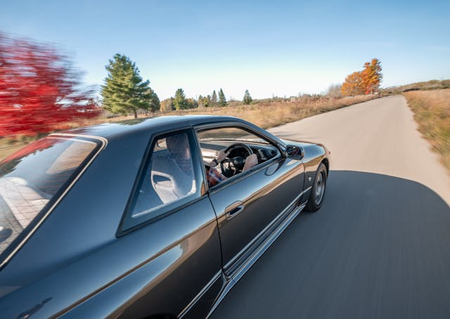 Nissan Skyline GT-R R32 driving rear