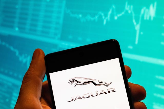 Jaguar word mark logo on cell phone screen