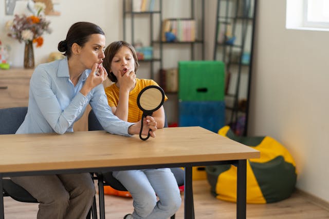 speech therapist and child