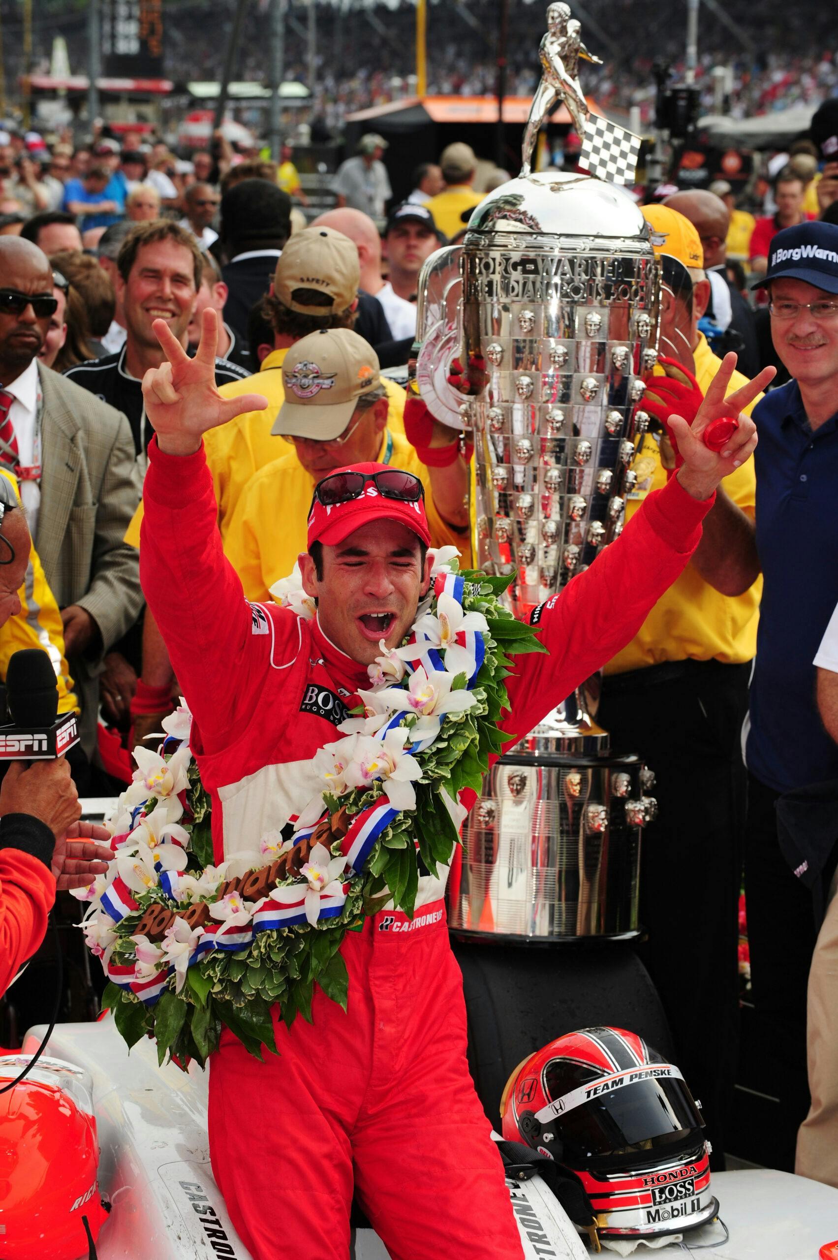 Castroneves celebrates in Victory Lane after winning the 93rd running of the Indianapolis 500 on May 24, 2009