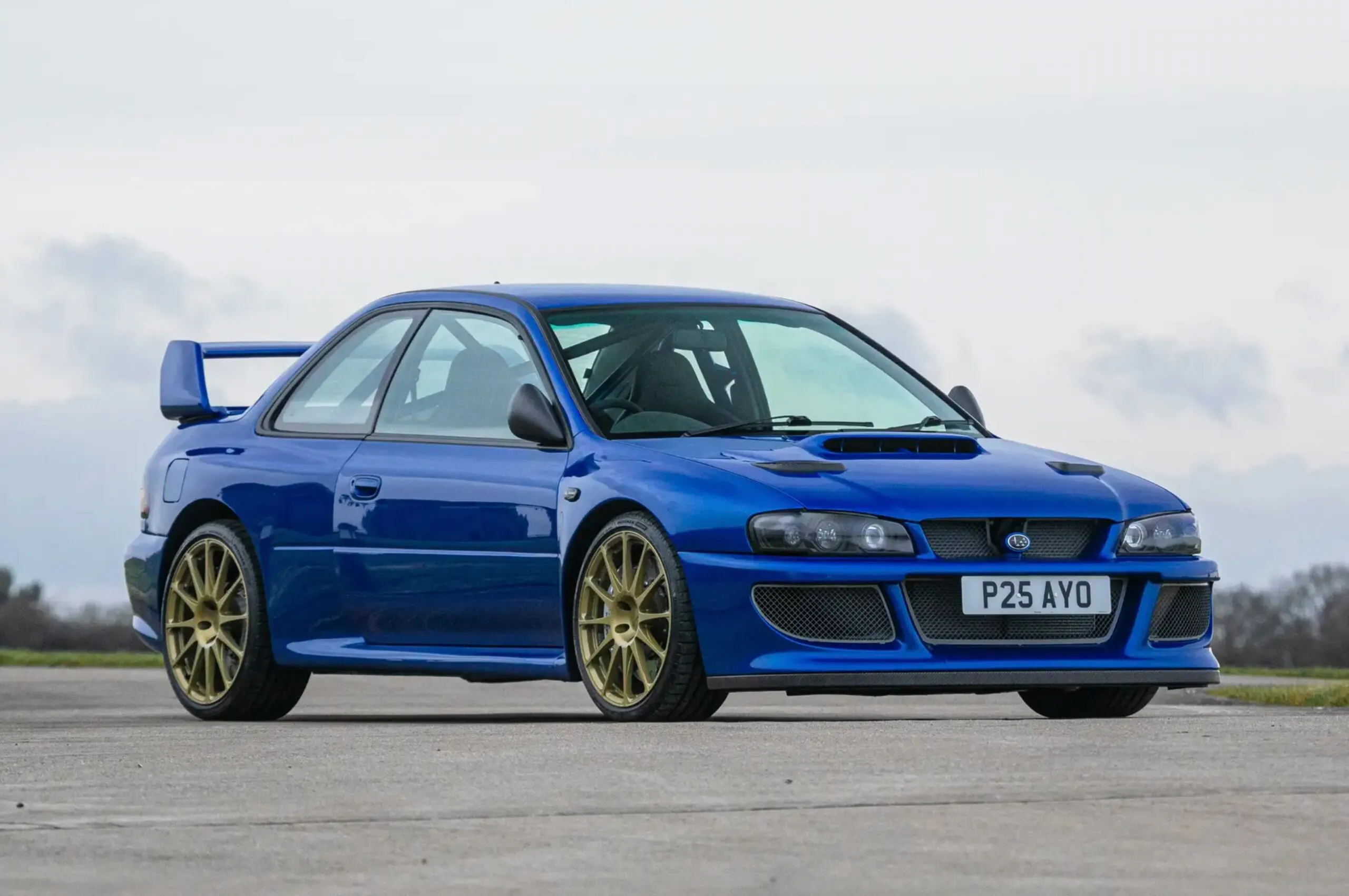 At $712K, Iconic Auctioneers Sneaked a Prodrive P25 into Blue-Chip