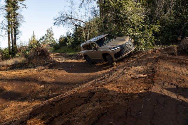 2025 Lexus LX 700h Overtrail off-roading exterior front end angled on hillside