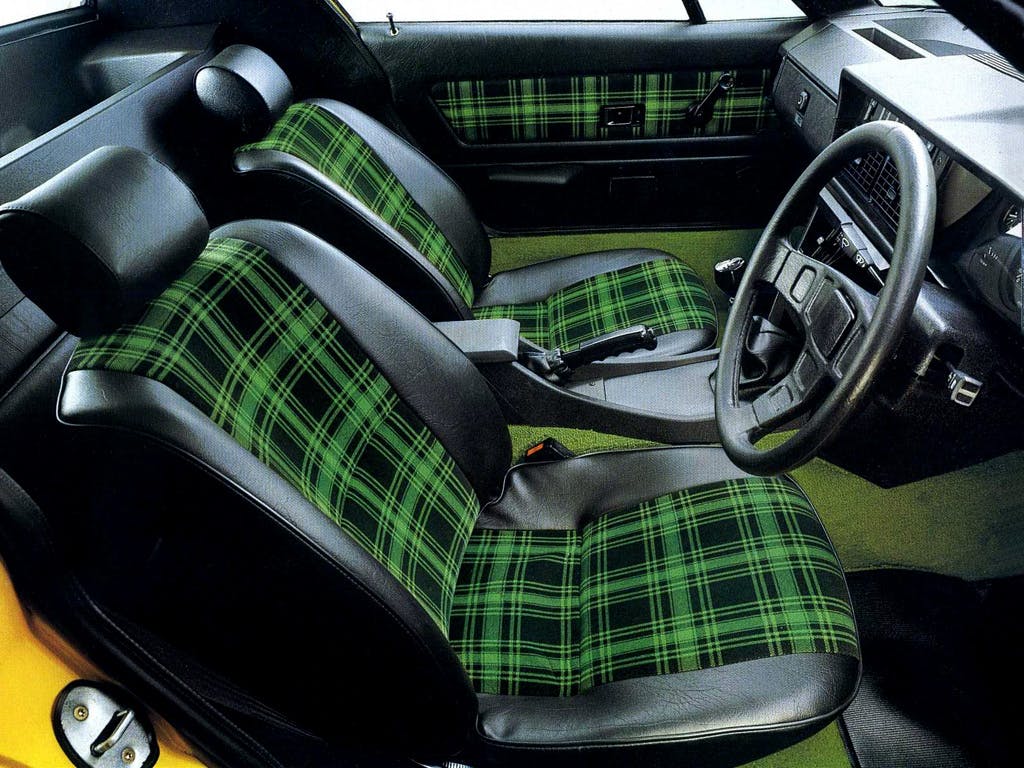 Triumph TR7 green plaid interior