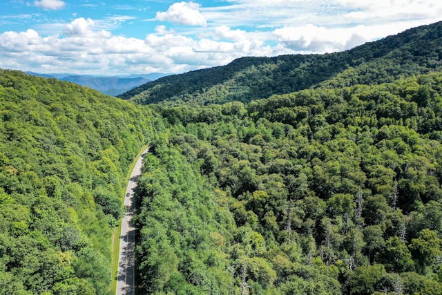 Cherohala Skyway 2025 Hagerty Road of the Year 2017 Chevrolet Corvette wide high angle drone