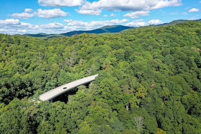 Cherohala Skyway 2025 Hagerty Road of the Year 2017 Chevrolet Corvette wide high angle drone