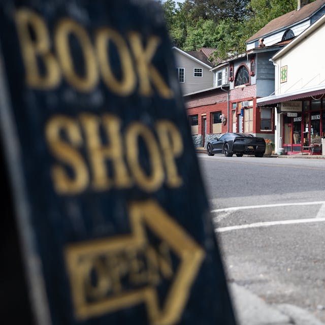 Cherohala Skyway 2025 Hagerty Road of the Year 2017 Chevrolet Corvette rear three quarter book shop foreground