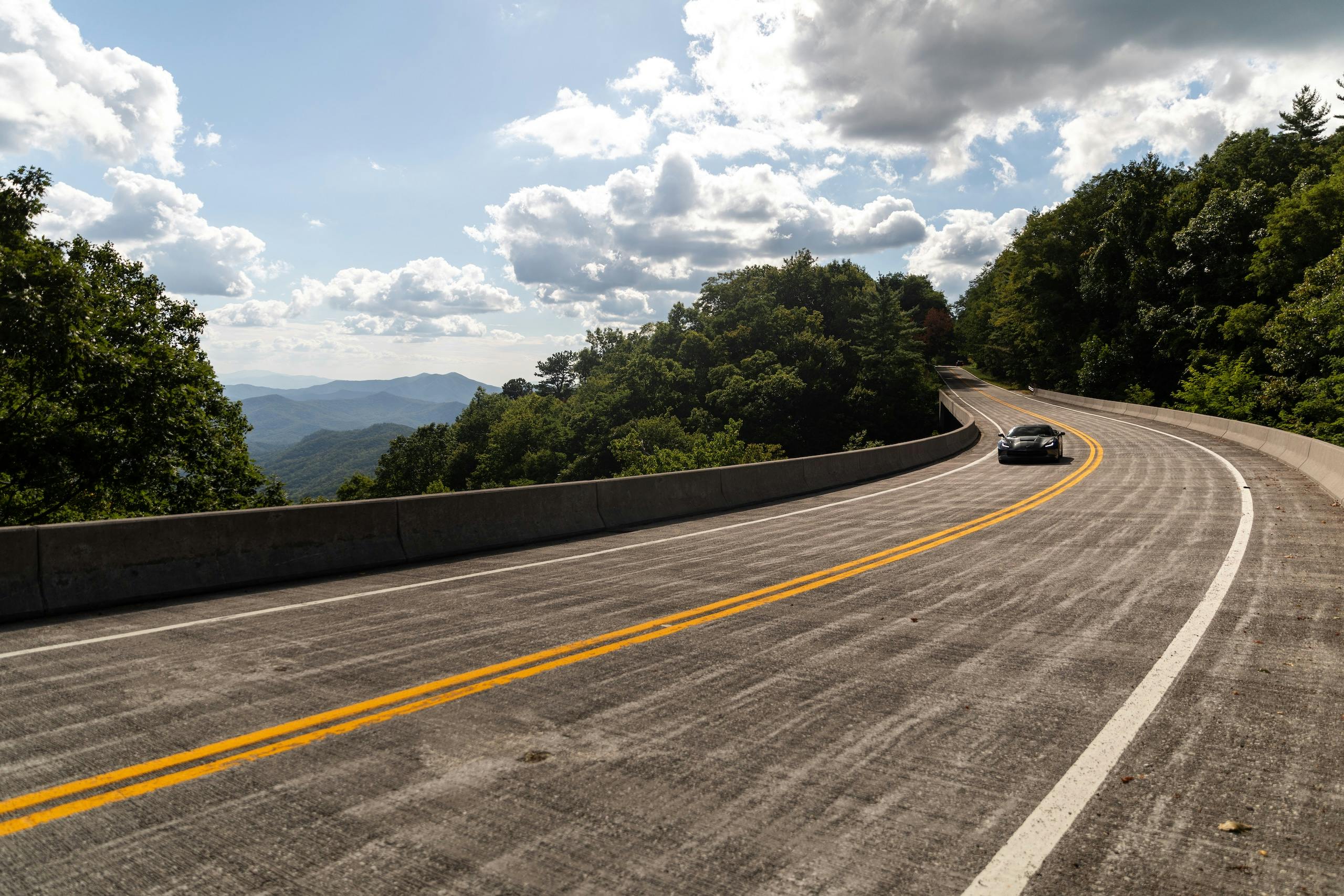Cherohala Skyway 2025 Hagerty Road of the Year 2017 Chevrolet Corvette cornering wide pan