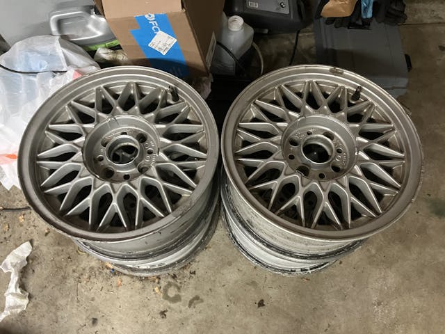 stack of old bmw wheels