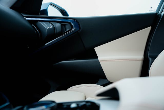 2025 BMW X3 30 xDrive interior door card detail