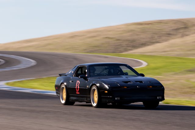 Hertel Trans Am GTA track car front three quarter dynamic track action