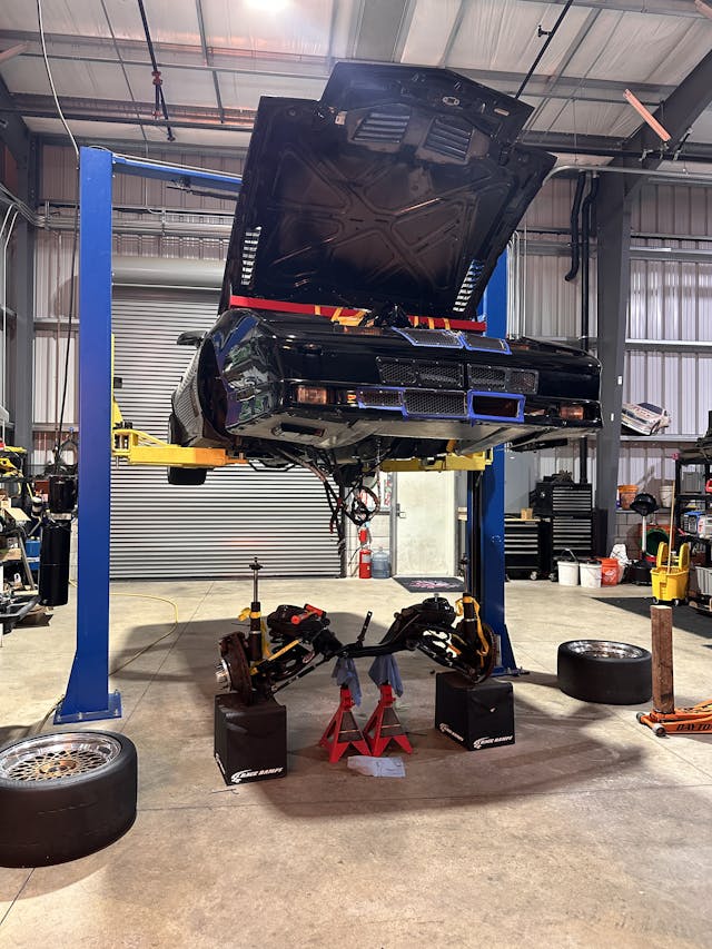 Hertel Trans Am GTA track car on lift