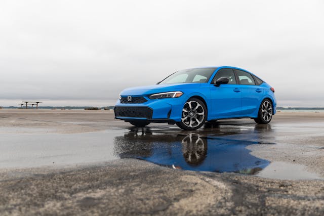 2025 Honda Civic Hatchback Sport Touring Hybrid front three quarter