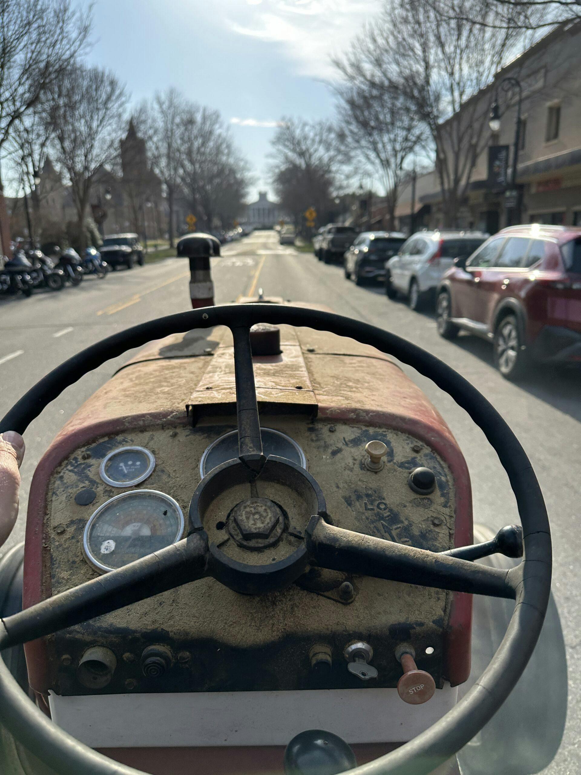 tractor pov driving down town main street