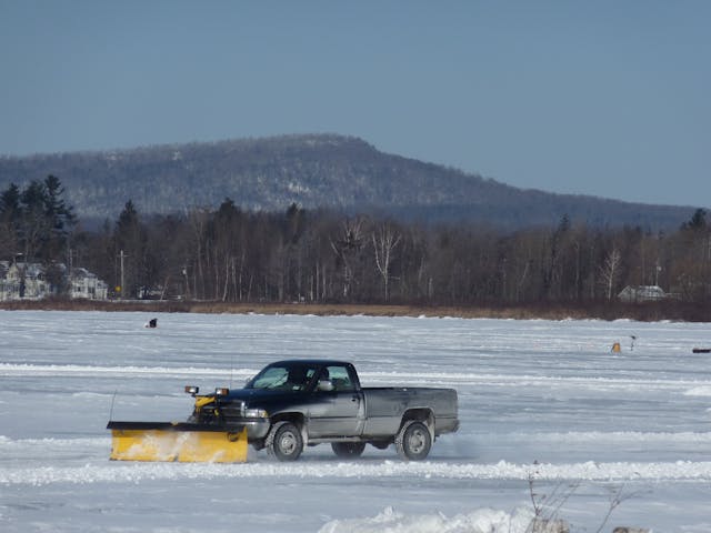 A volunteer plowing