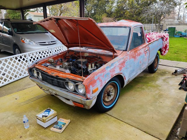 1975 Datsun 620 front 3/4 hood up