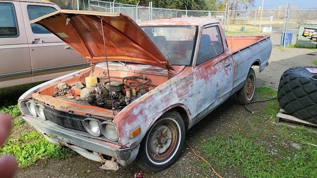 1975 Datsun 620 front 3/4 hood up
